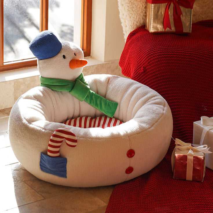 Side view of Hug Snowman Cat Bed showing candy cane pocket and plush snowman design, ideal for holiday pet decor.