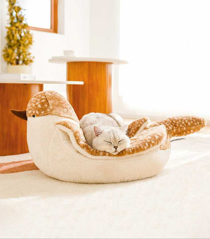 Cat peacefully napping in the Sparrow Cat Bed with cozy bird design. Ideal for pet owners seeking stylish cat furniture.