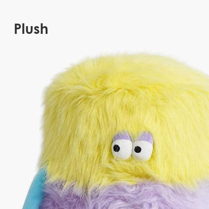 Close-up of the plush yellow top of the Little Monster Stool Cat Bed, emphasizing its soft and cozy material.