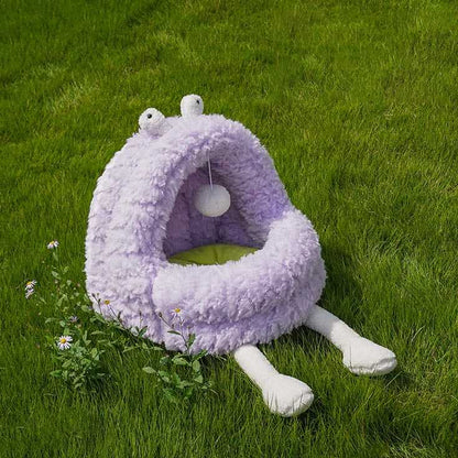 Purple Monster Series Cat Bed with dangling toy and plush legs on grass, designed for interactive and cozy cat lounging.